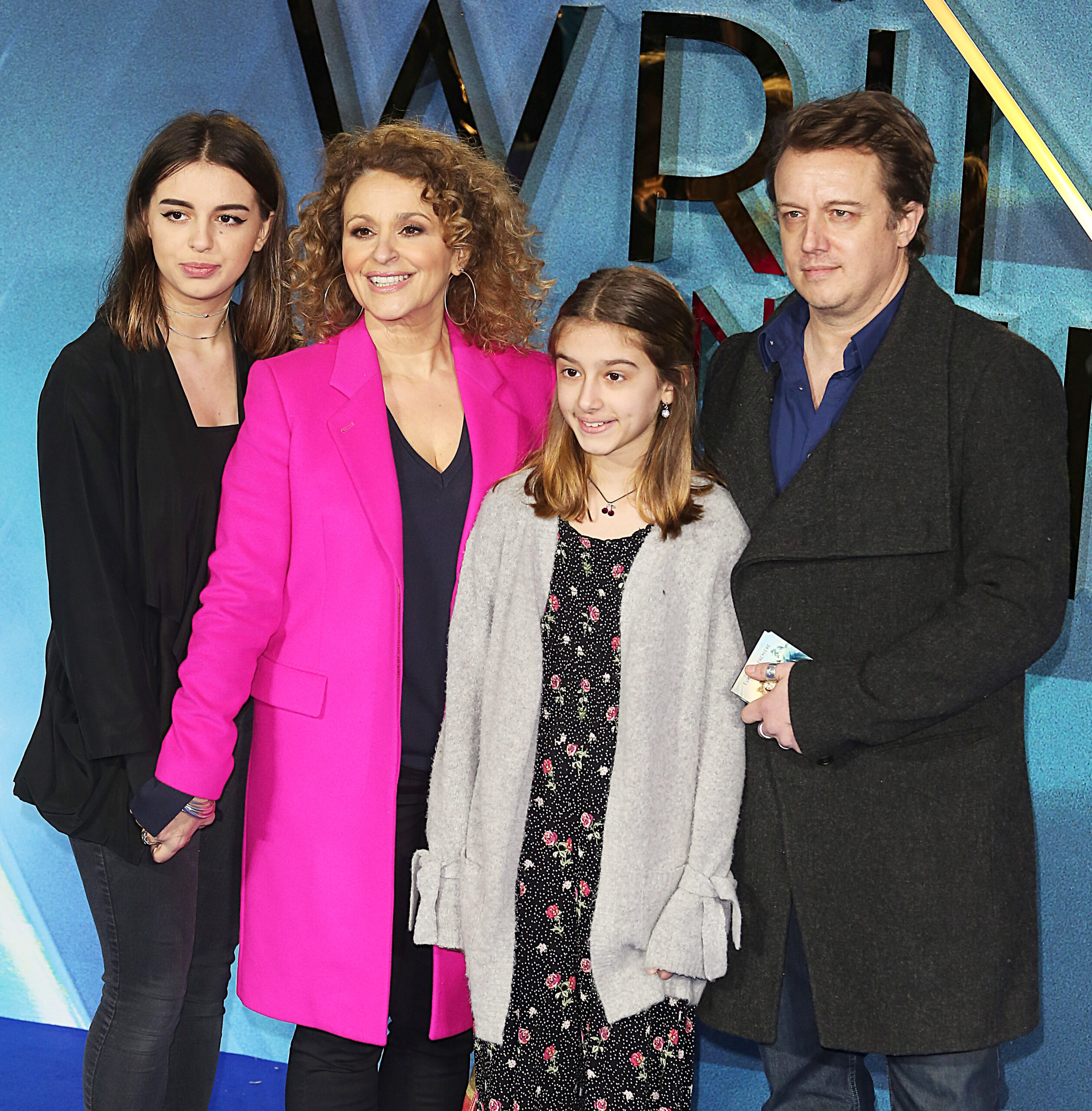 Nadia Sawalha with her husband and kids