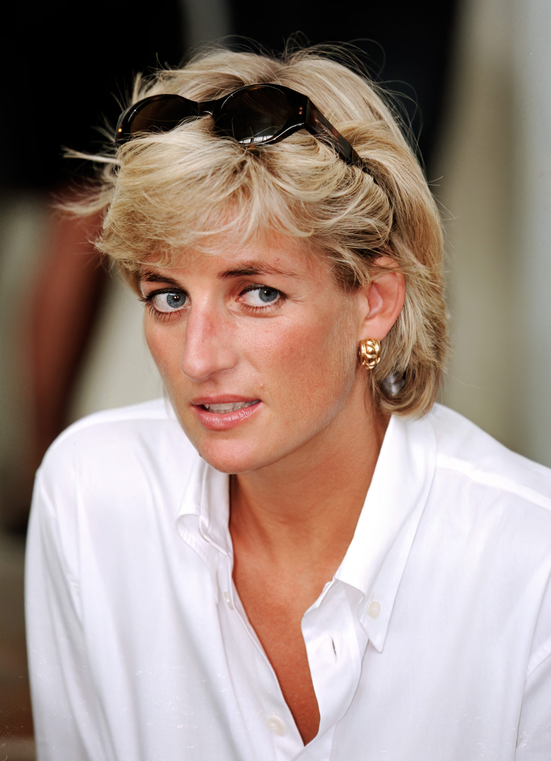 Princess Diana in white shirt and sunglasses