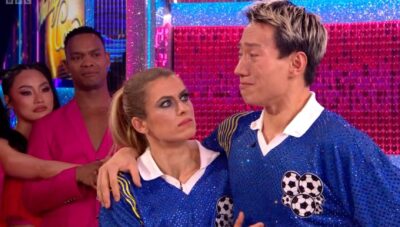 Nancy Xu staring at Carlos Gu and Karen Carney