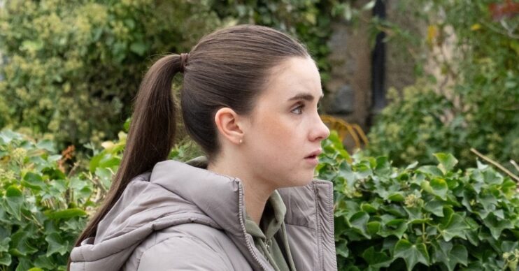 April looks worried in Emmerdale (Credit: ITV)