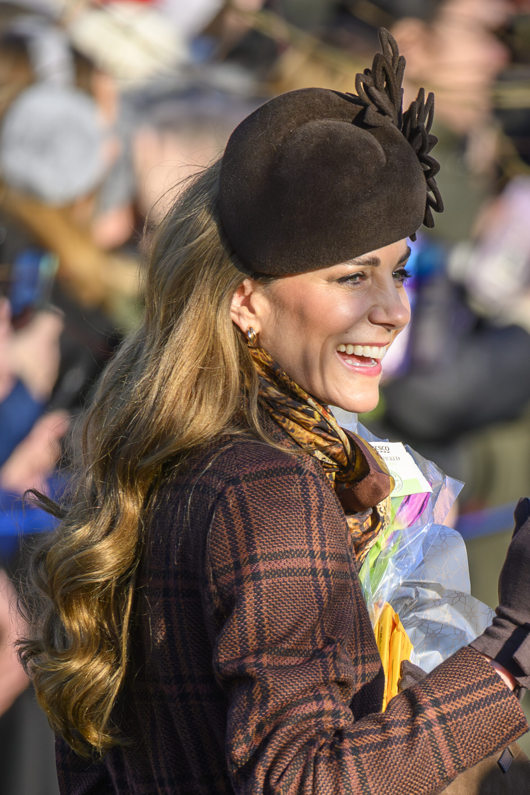 Kate Middleton smiling and waving on Christmas Day
