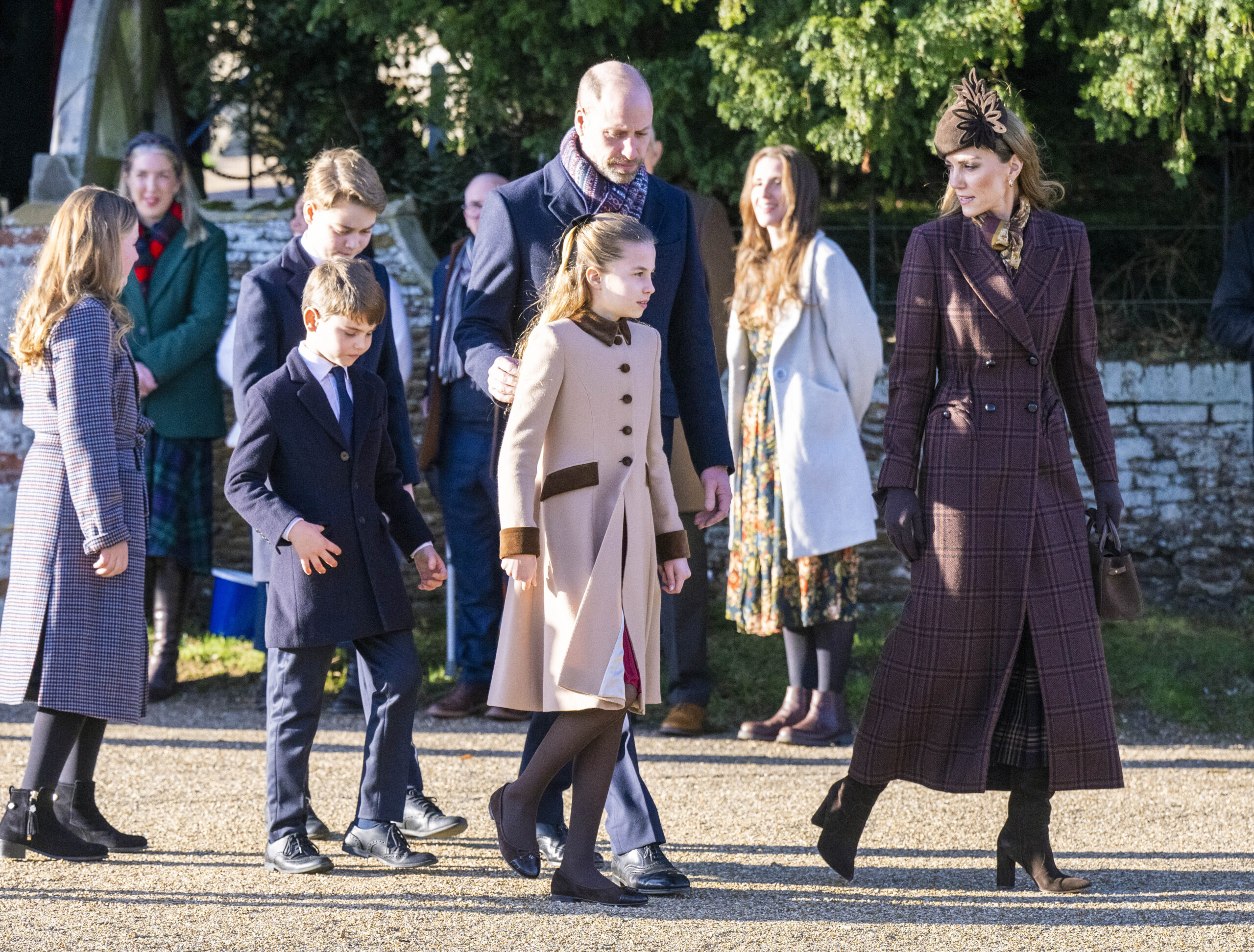Prince William, Kate Middleton, Prince George, Princess Charlotte and Prince Louis at Christmas Day walkabout 