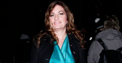 Karren Brady in turqouise dress
