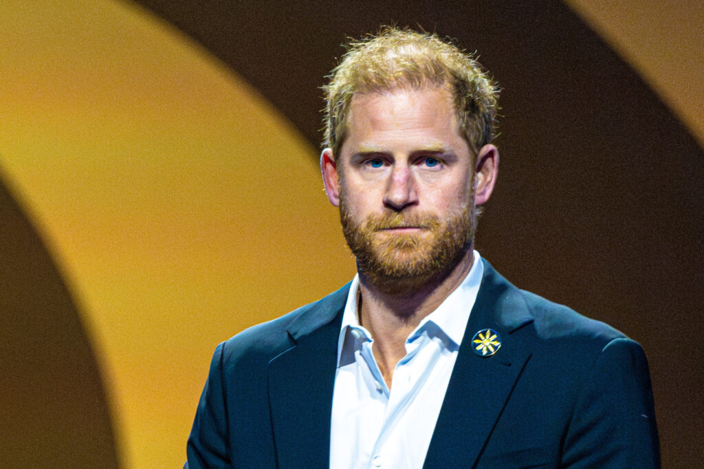 Prince Harry frowning