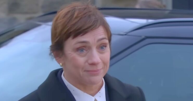 DS Walsh in Emmerdale smiles (Credit: ITV)