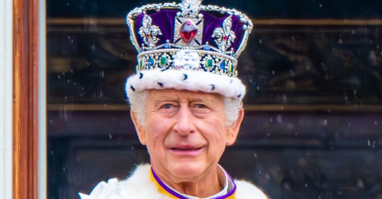 King Charles on palace balcony during coronation