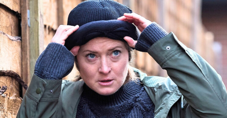 Coronation Street's Becky putting hat on