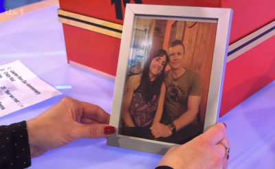 Sonia on Deal or No Deal holding a photo