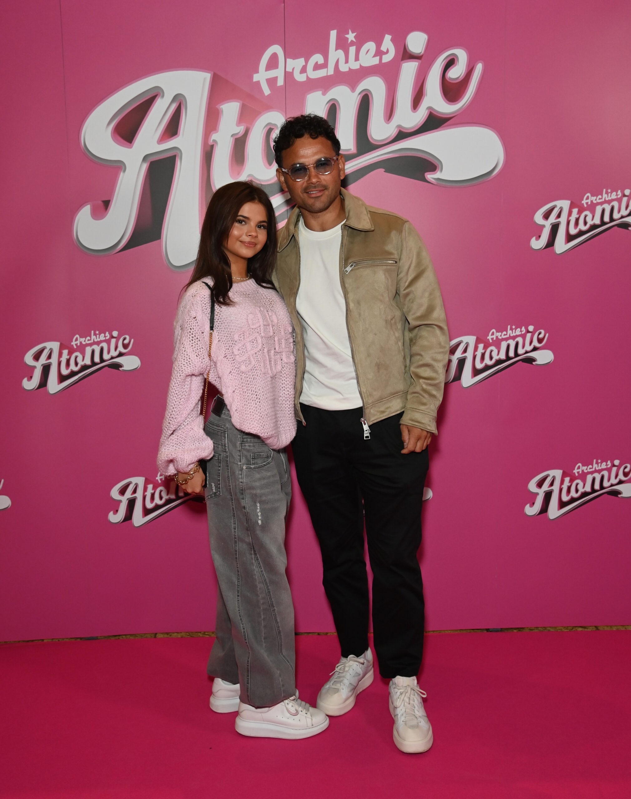 Ryan Thomas with daughter Scarlett at an event 