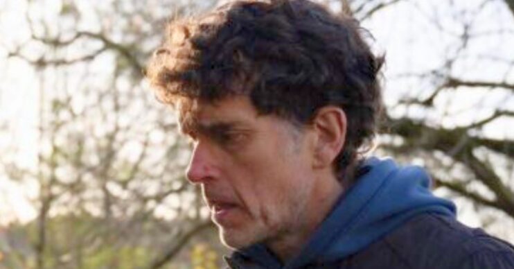 Marlon in Emmerdale looks anxious (Credit: ITV)