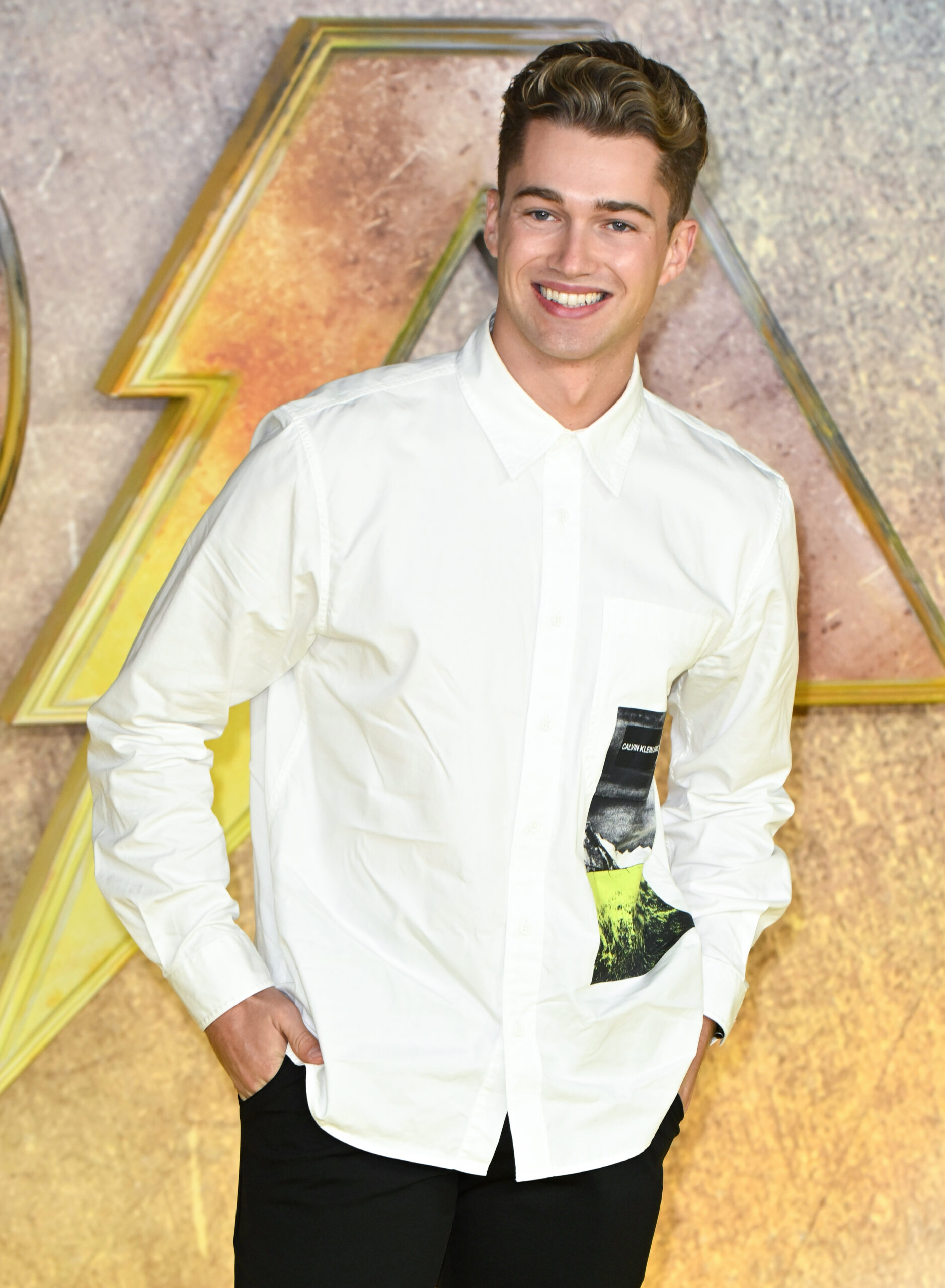 AJ Pritchard smiling on the red carpet