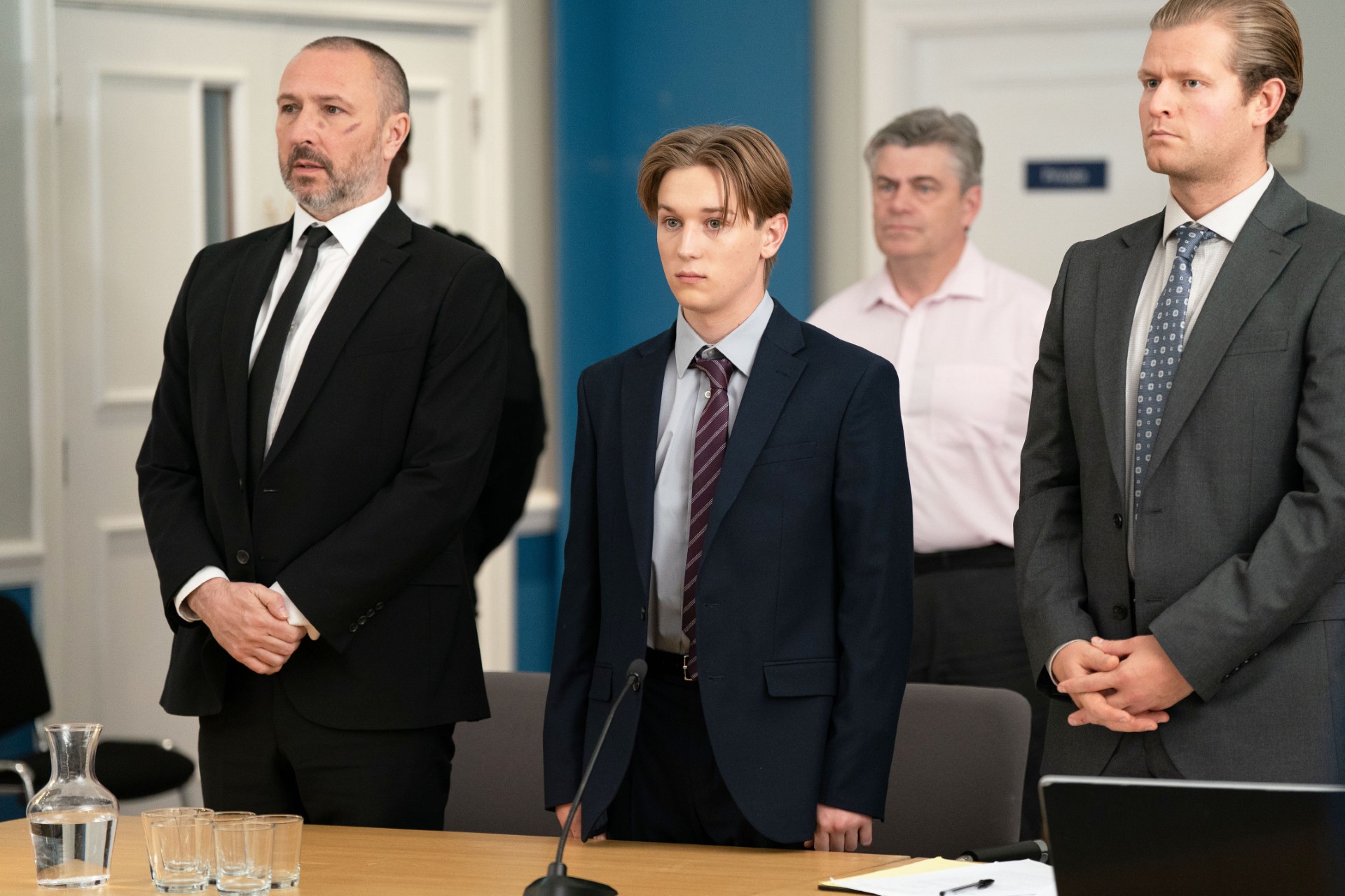 Joel in court with his dad, Ross