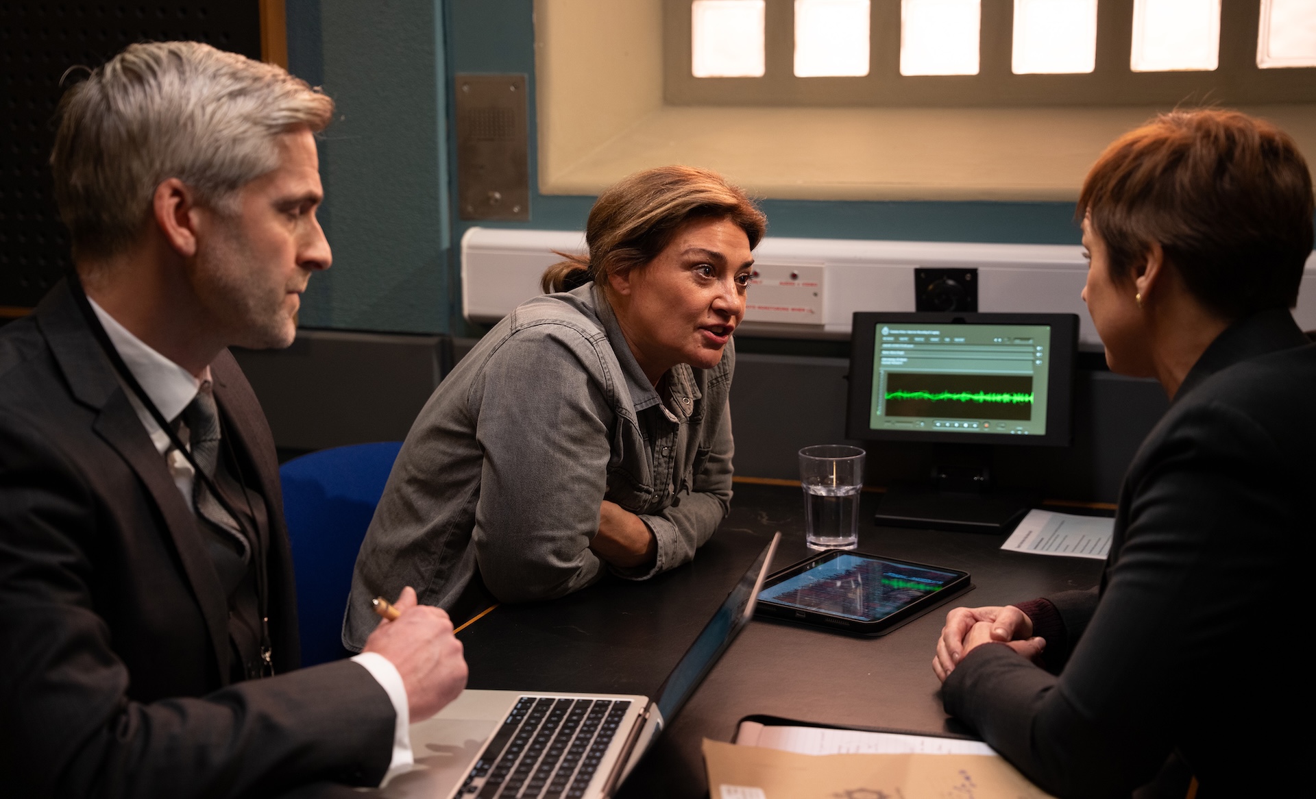 Moira panics in the police interview room