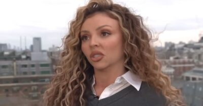 Jesy Nelson in grey jumper and blouse