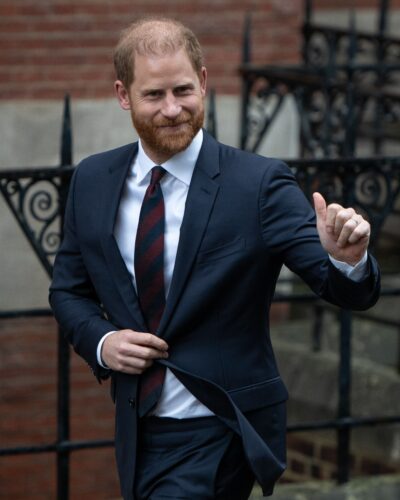 Prince Harry waving and smiling