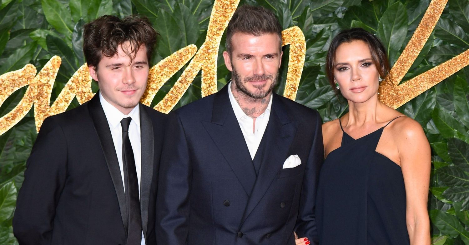 Victoria, David and Brooklyn on a red carpet together