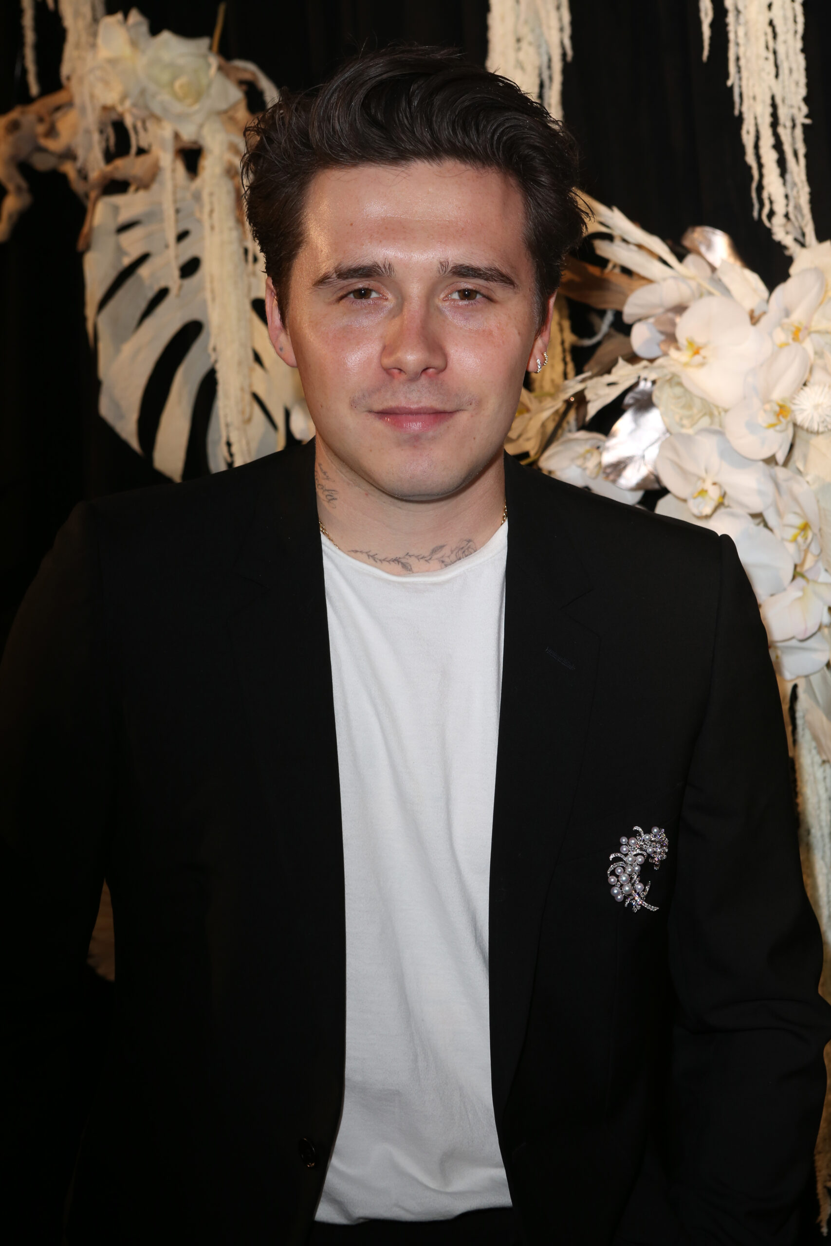 Brooklyn Beckham looking to camera