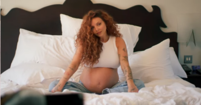 Jesy Nelson showing her baby bump