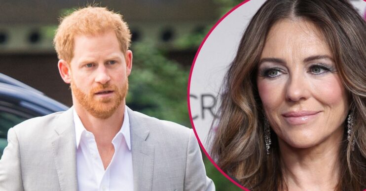 Prince Harry frowning beside Elizabeth Hurley