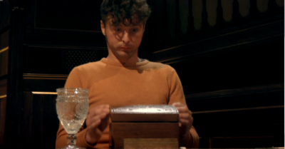 James opening a chest on The Traitors