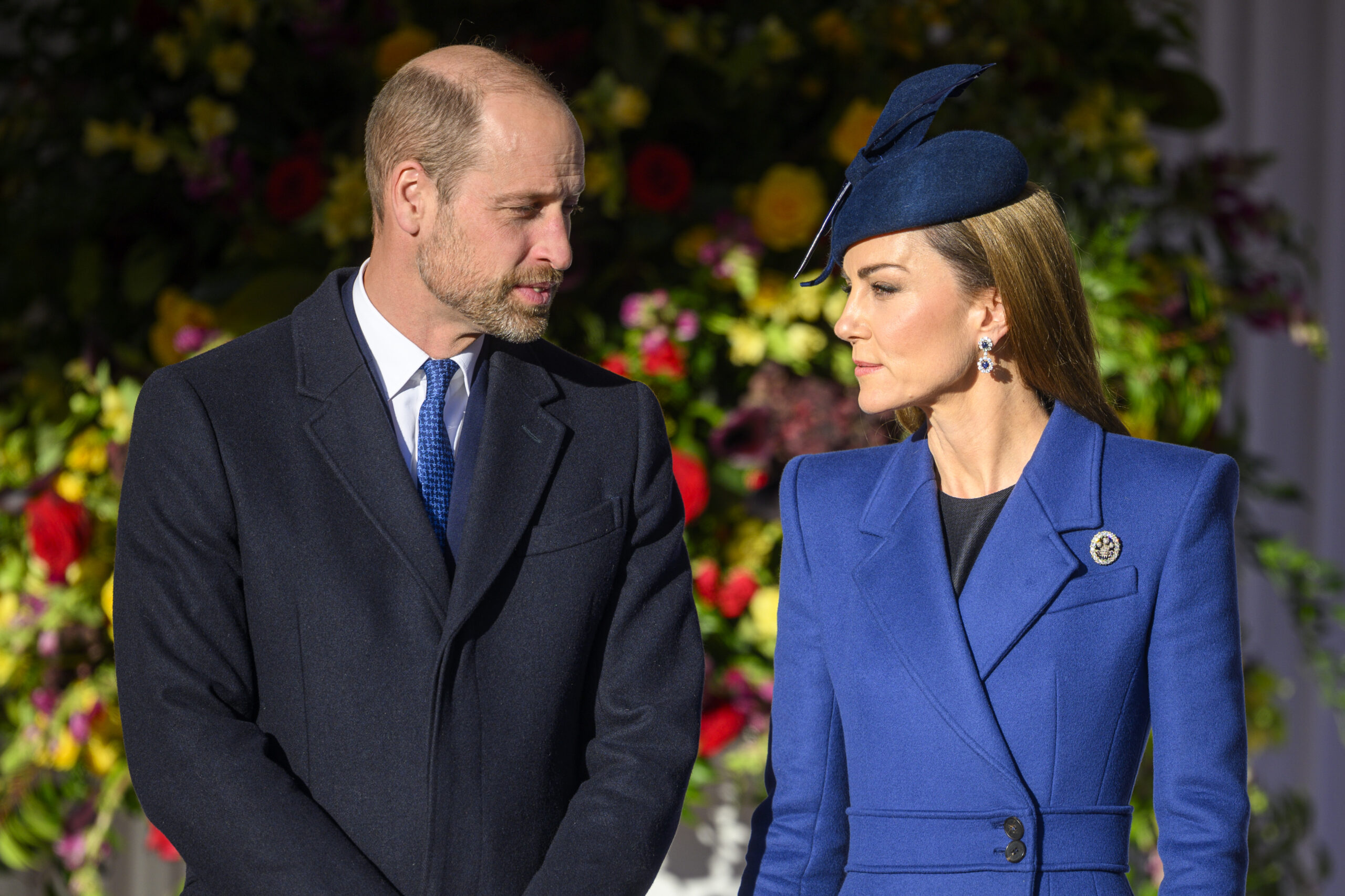 Prince William and Kate Middleton looking at one another 