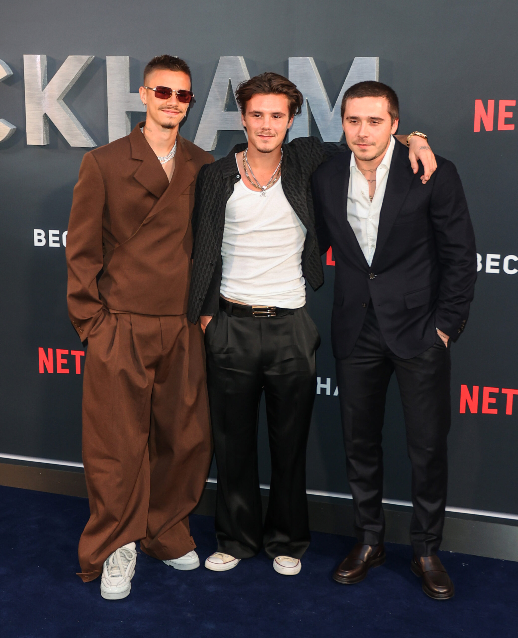 Romeo, Cruz and Brooklyn Beckham on the red carpet
