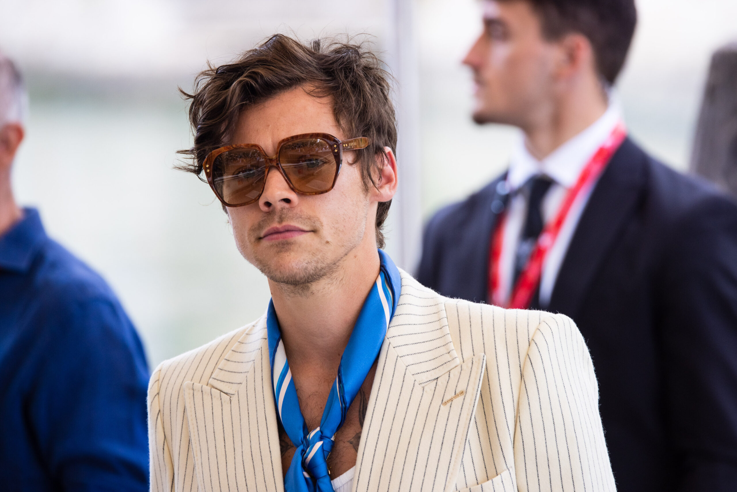 Harry Styles wearing sunglasses at event 