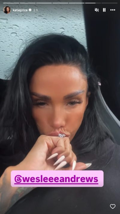 Katie Price kissing her wedding ring