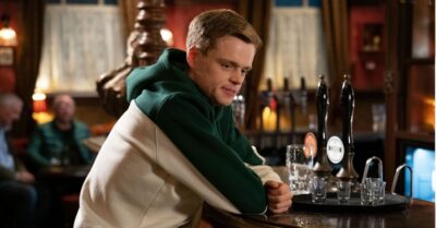 Oscar drinking at the bar in The Vic in EastEnders