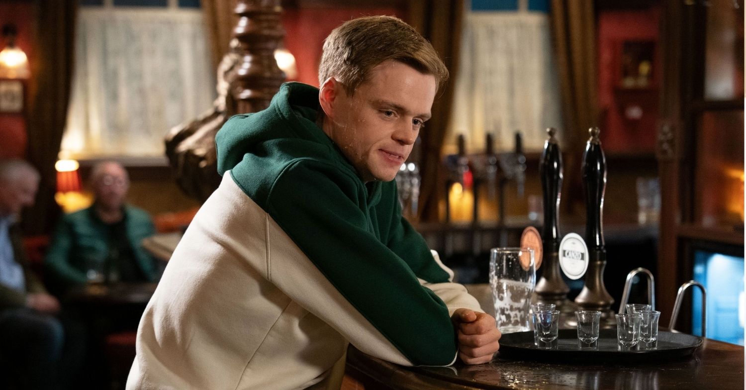 Oscar drinking at the bar in The Vic in EastEnders 