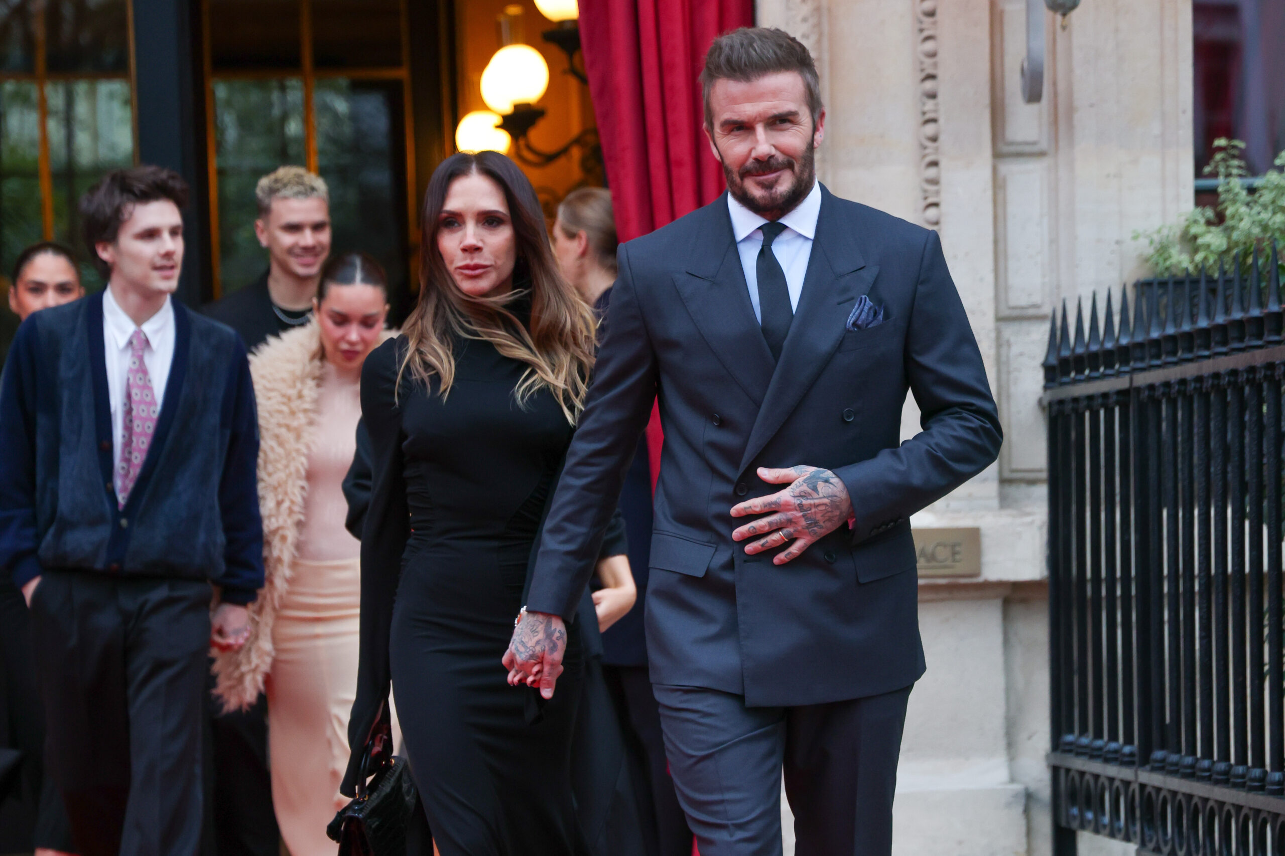 Victoria and David Beckham walking together