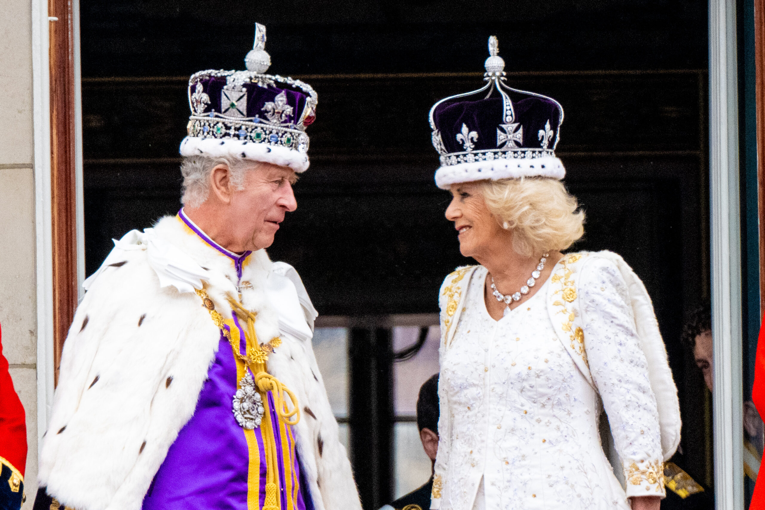 King Charles and Queen Camilla on palace balcony at coronation