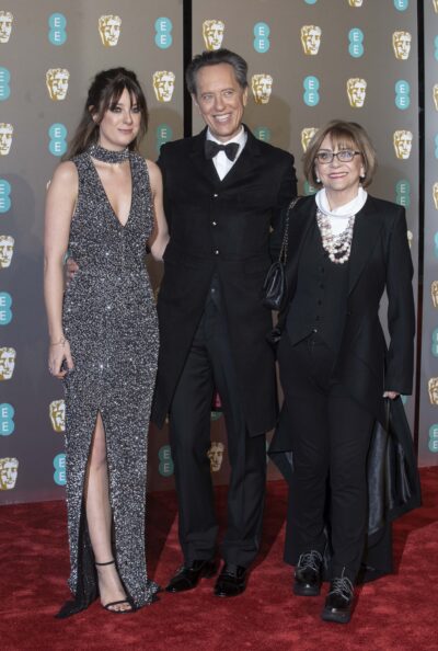 Olivia Grant, Joan Washington and Richard E Grant on the red carpet