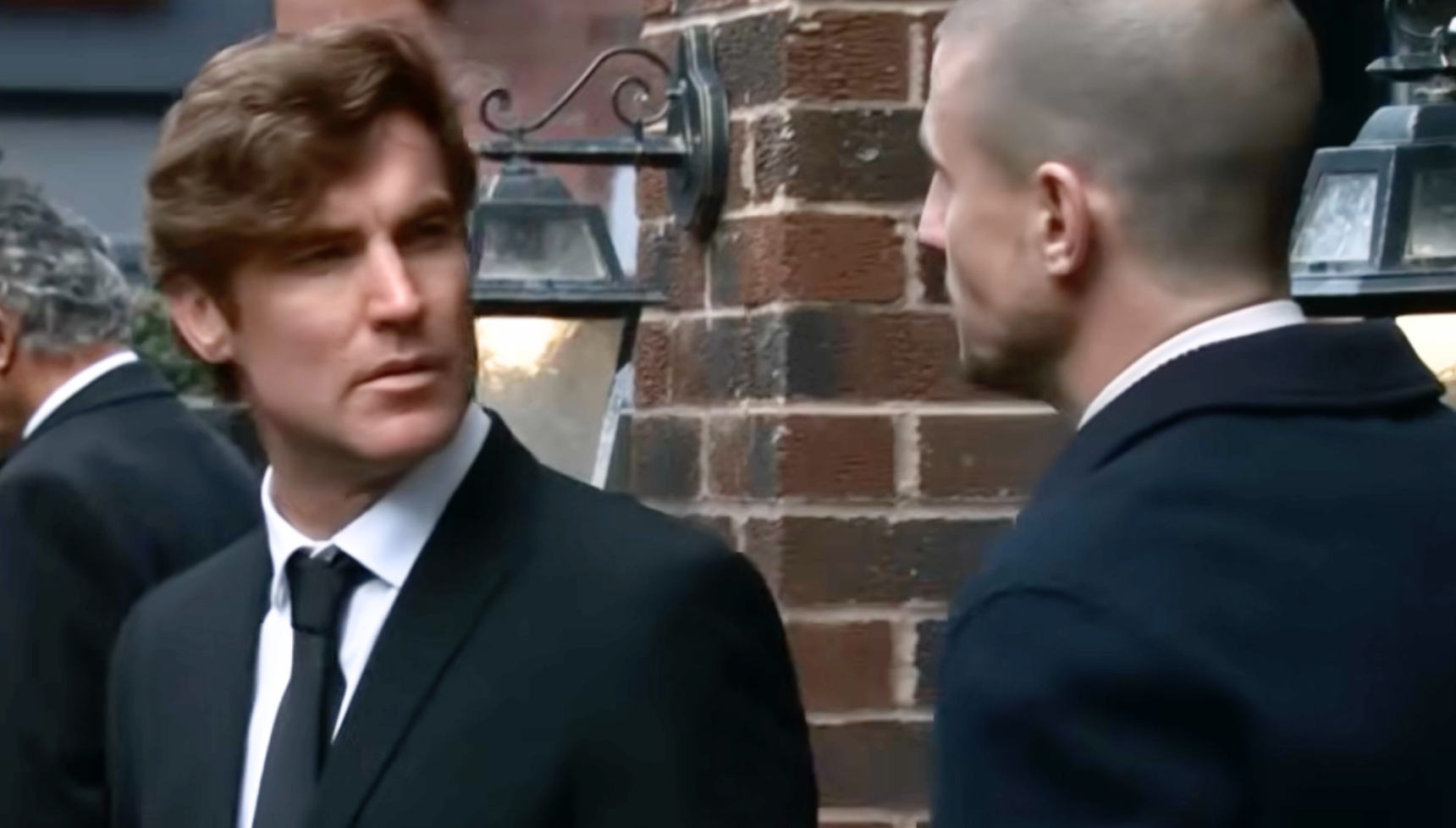 Coronation Street's Theo talking to Carl outside 