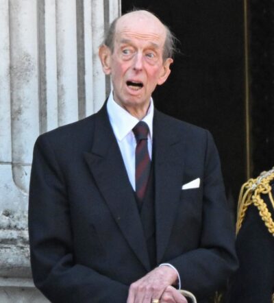 Duke of Kent on palace balcony in suit