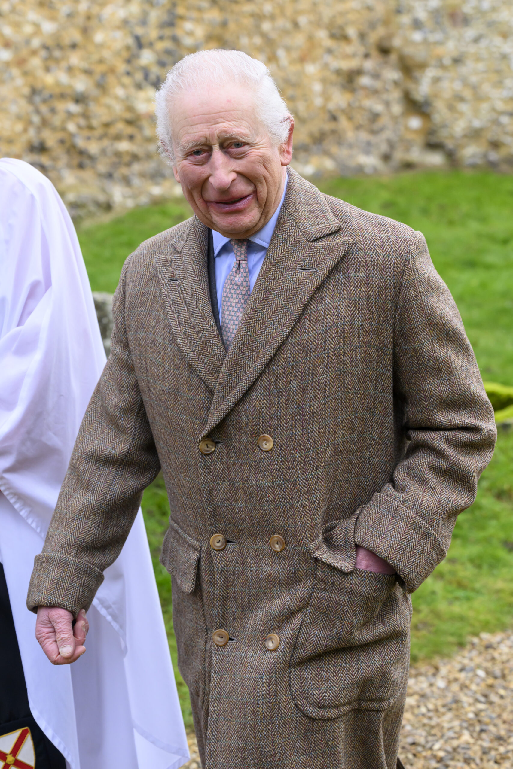 King Charles in beige coat during outing