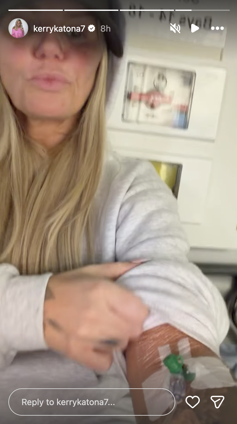 Kerry Katona showing her arm in hospital