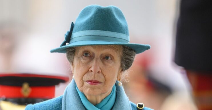Princess Anne in blue outfit and hat