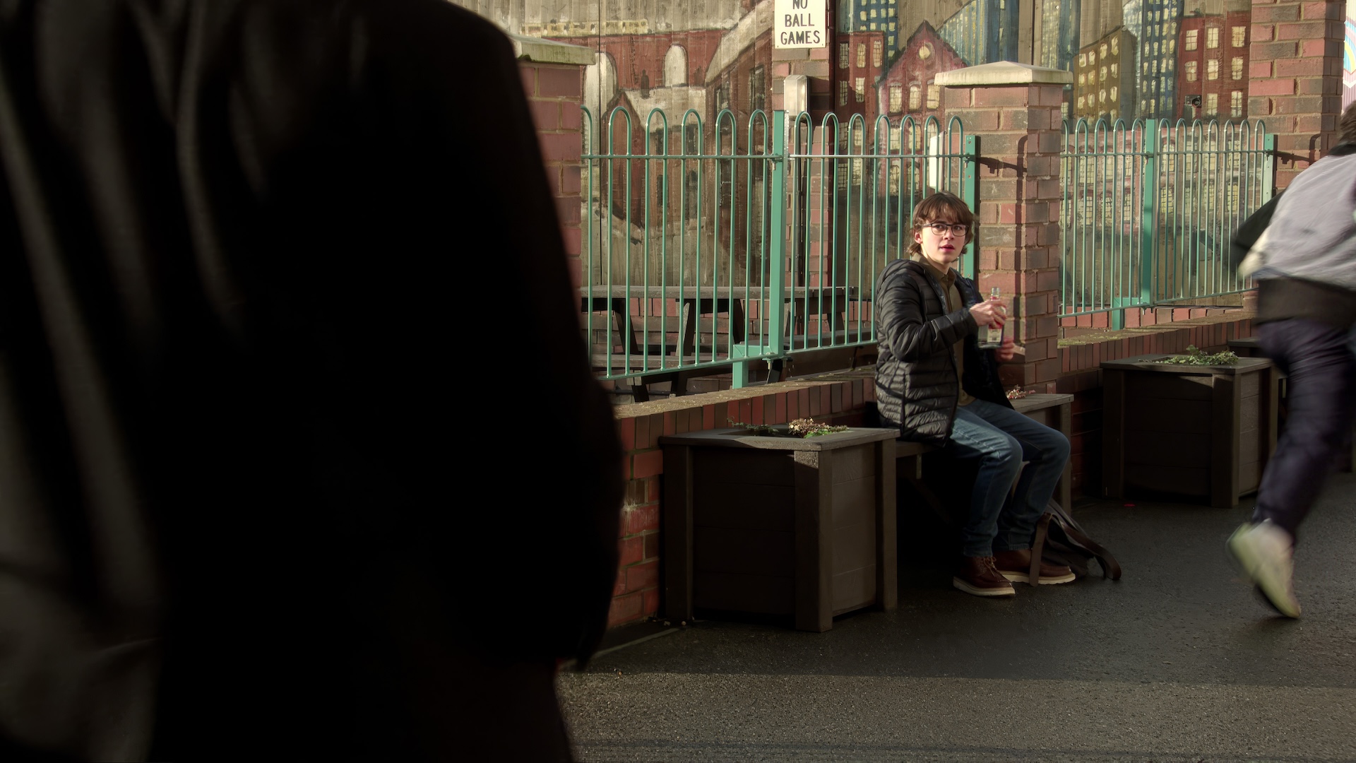 Sam on bench in Coronation Street