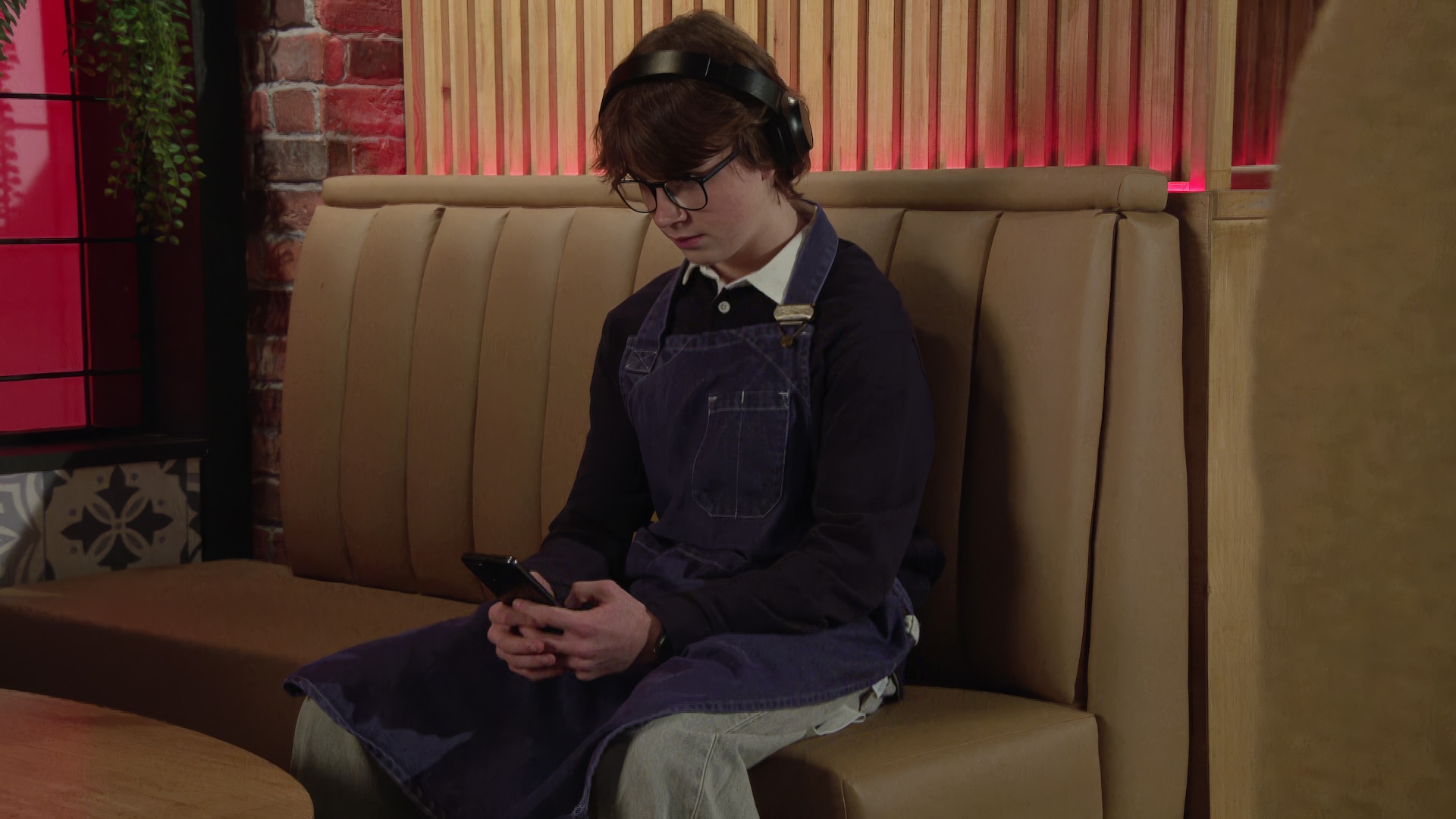 Sam on phone in Coronation Street