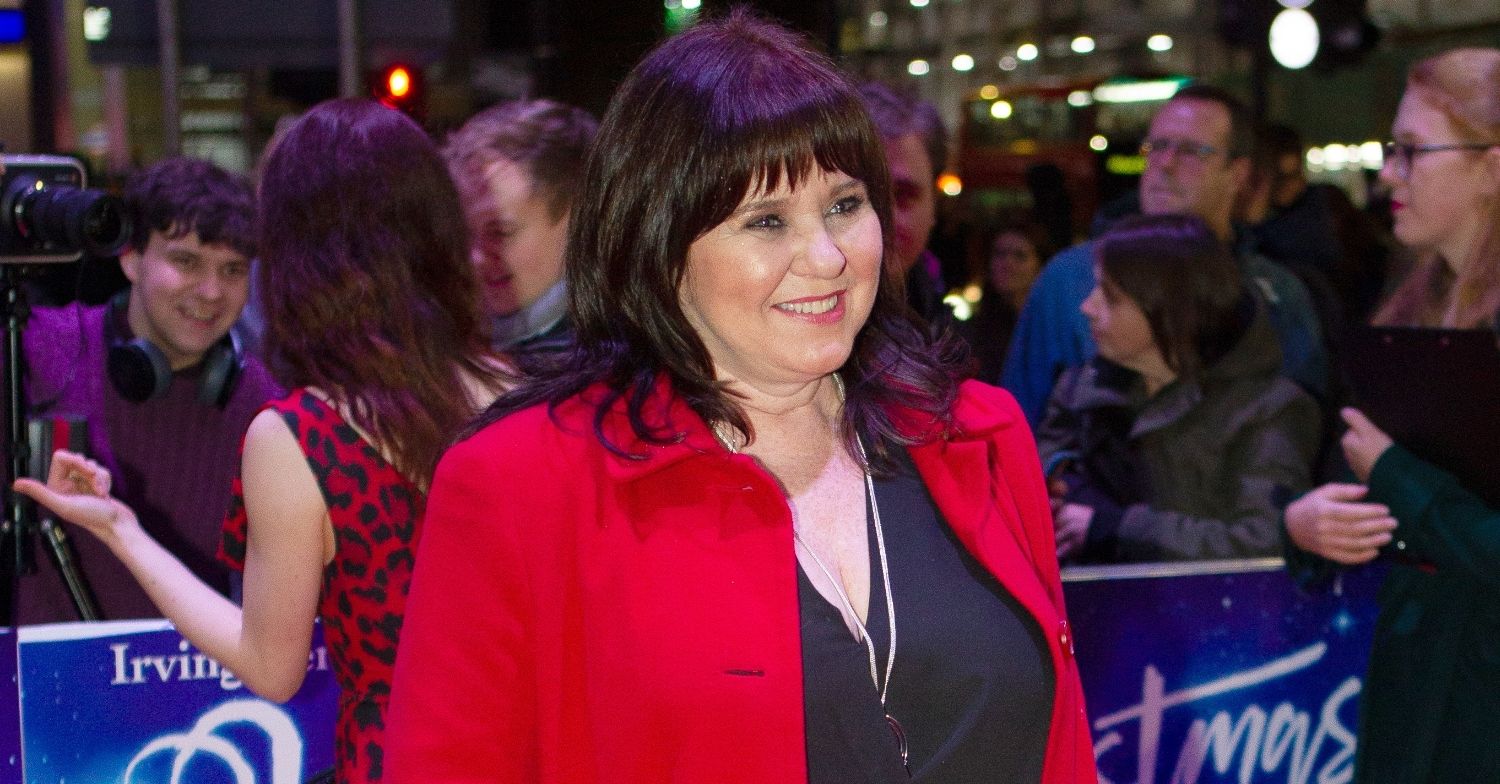 red carpet coleen in red jacket