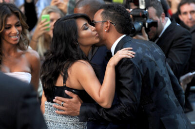 Kim Kardashian kissing Lewis Hamilton