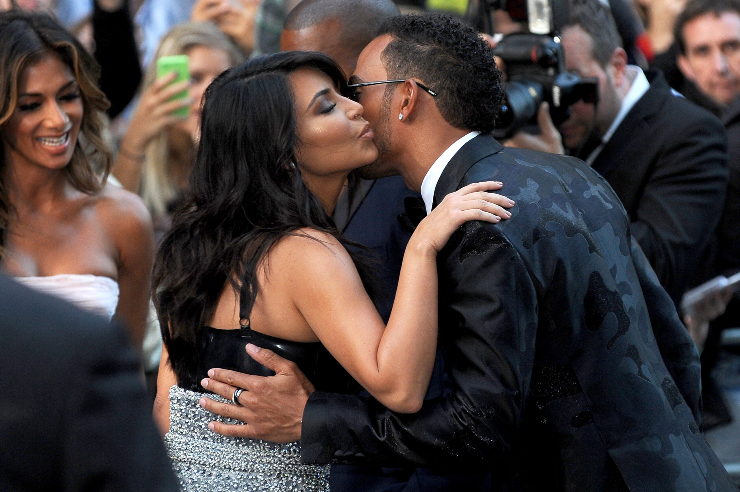 Kim Kardashian kissing Lewis Hamilton