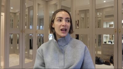 Frankie Bridge looking to the side