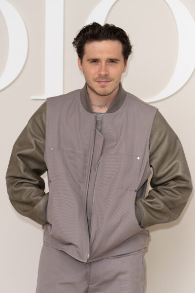 Brooklyn Beckham looking to camera