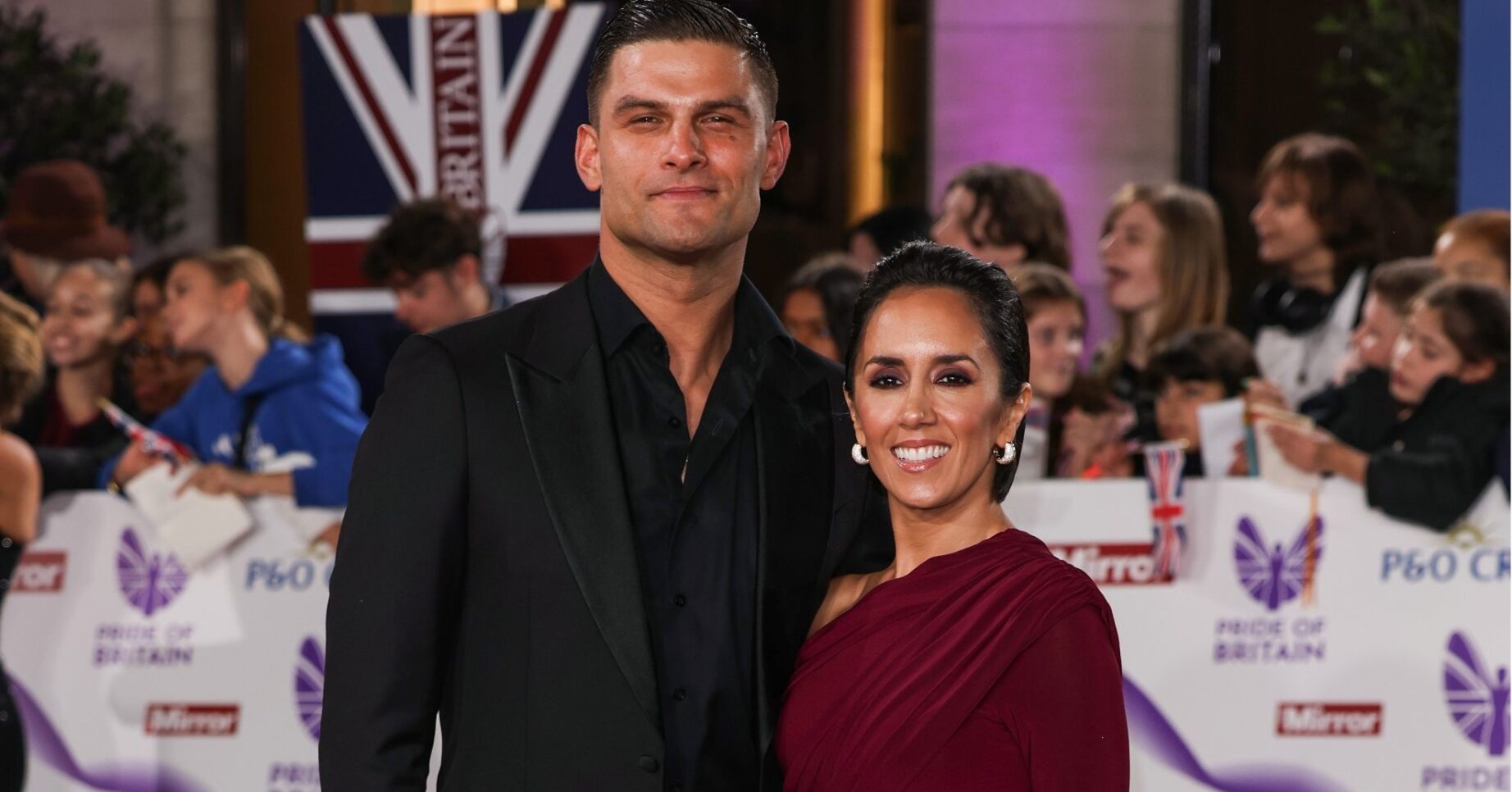 Aljaz Skorjanec and Janette Manrara smiling