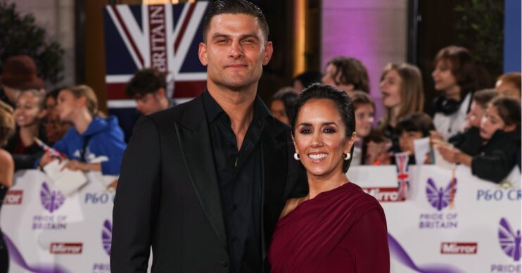 Aljaz Skorjanec and Janette Manrara smiling