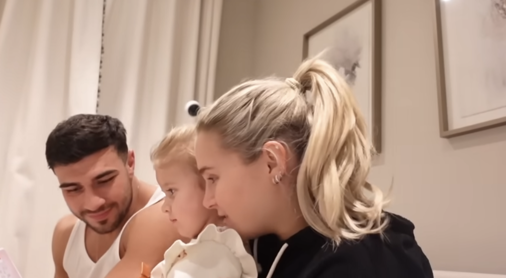 Molly-Mae, Bambi, and Tommy Fury reading together