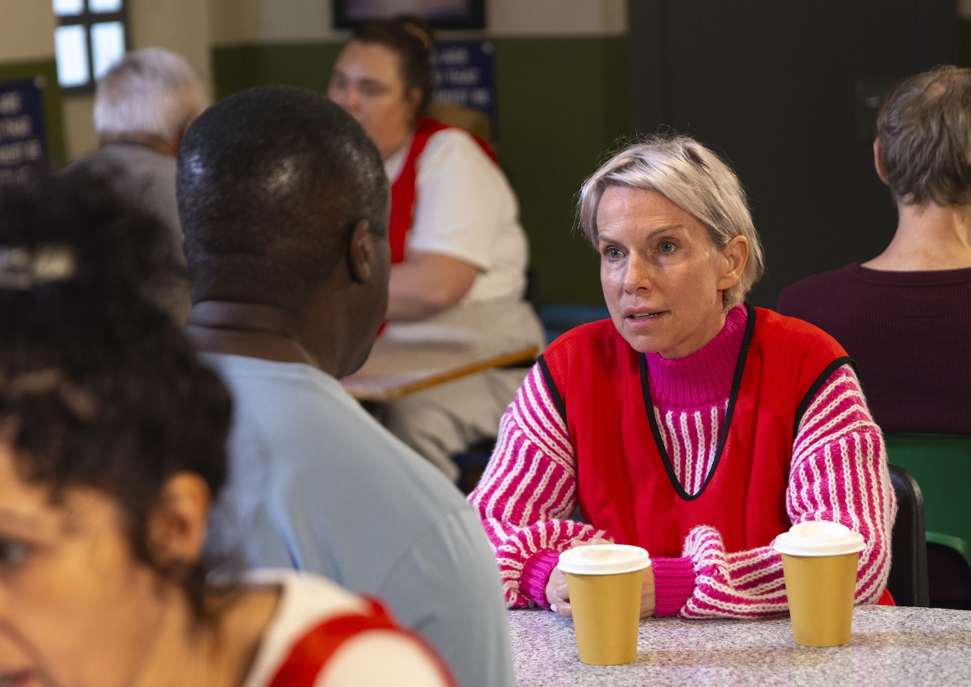 Debbie and Ronnie talking in prison in Coronation Street