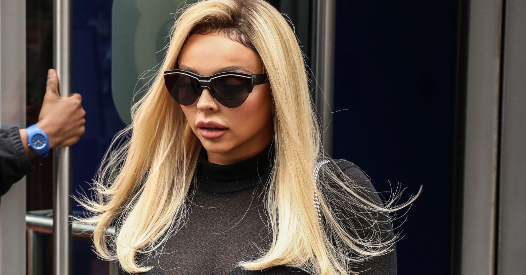 Jesy Nelson looking down